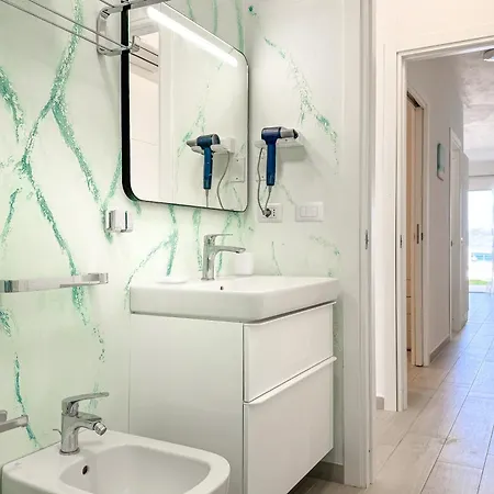 شقة Domusmeralda - Corallo - Con Giardino, Piscina E Vista Mare كانّيجوني